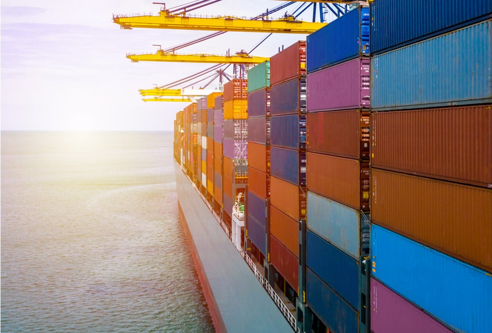 Cargo ship in water with cargo